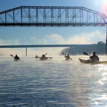 Kayakers on TN River headed to the Walnut Street Bridge.jpg