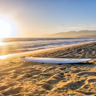 SantaMomica surfboard on beach