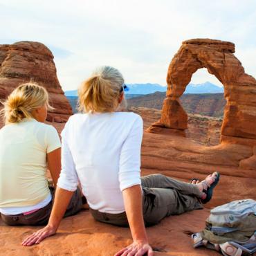Utah Hikers rest at Delicate Arch - Arches National Park - UOT (003)