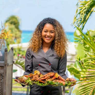 BAH Girl with food ©Bahamas Ministry Of Tourism & Aviation