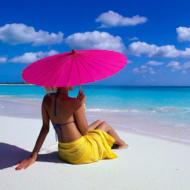beach lady with pink brolly.jpg